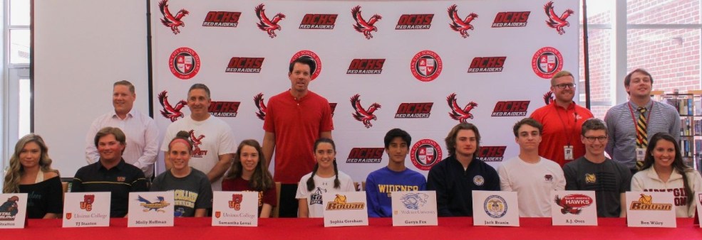 signing day coaches.jpg